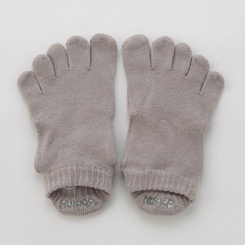 Knitido plus brand Basic Solid Colors Footie Grip Toe Socks With Power Pads in grey, viewed from the front flat