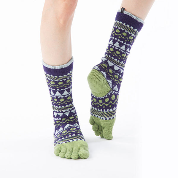 Front view of a woman's foot wearing a pair of Knitido plus brand Wool Blend Forest Textile Midcalf Toe Socks in purple with gray and yellow-green point colors